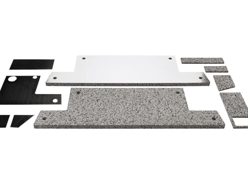 Mittatilaustyönä valmistettu akustiikkasarja teknisen laitteen äänieristykseen.